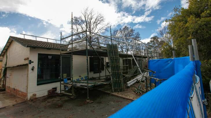 A house located in Bradfield Street, Downer is prepared to be rid of asbestos. A house in Pearce that was cleared under the "Mr Fluffy" program has now been sealed off. Photo: Katherine Griffiths