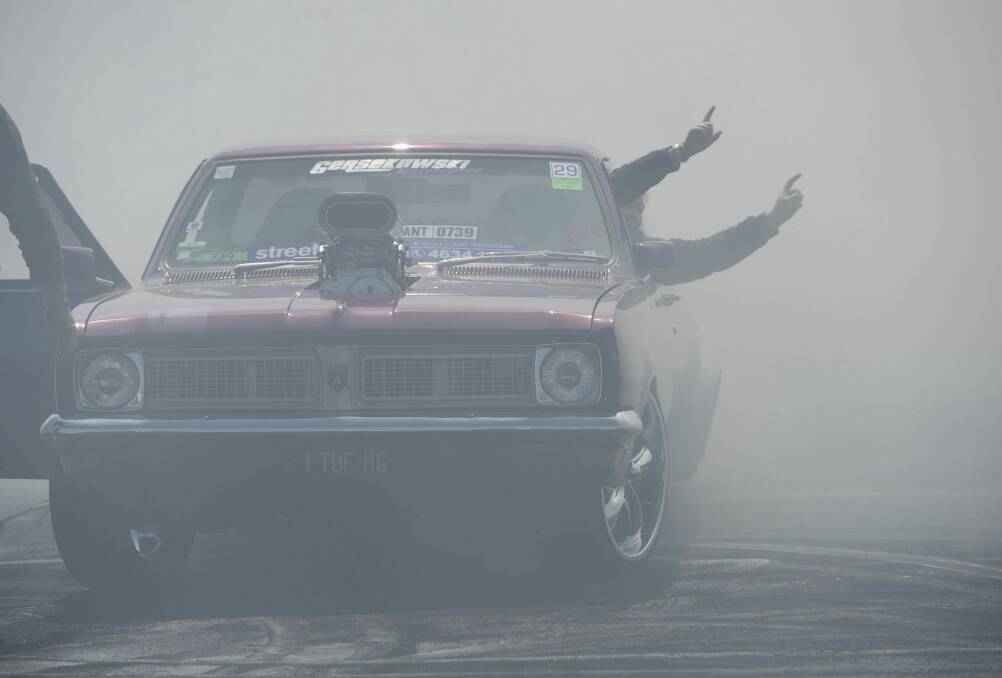 Summernats day two. Wannabe burnout masters raised hell at the eliminations on Friday. This Holden was a crowd pleaser. Photo: Graham Tidy