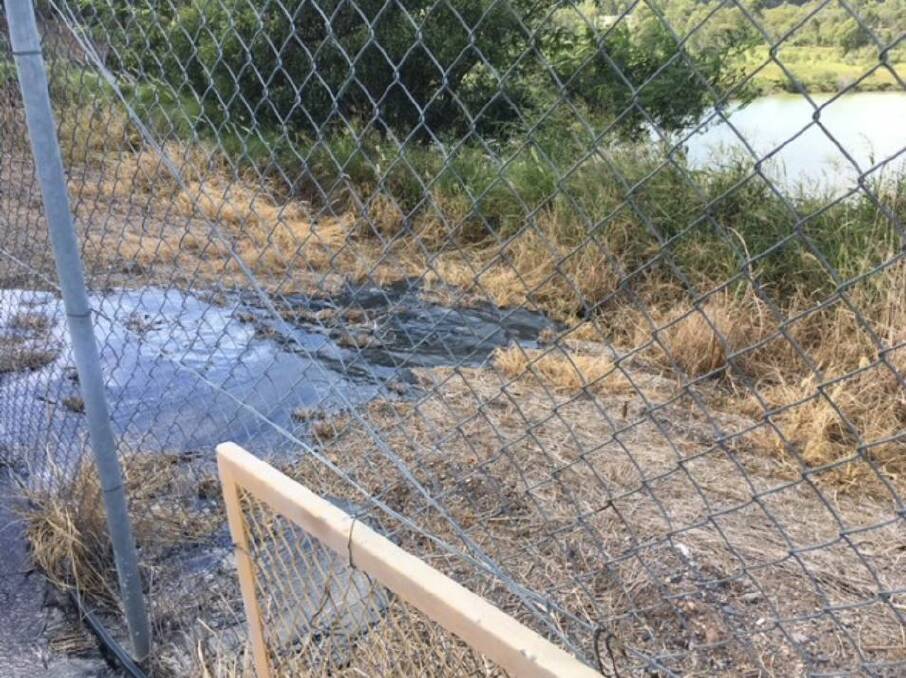 Liquid leaking for an explosives storage facility beside the site of a proposed super dump at Ipswich on April 1. Photo: Supplied
