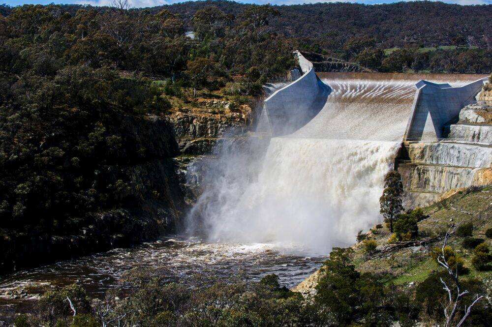 The Googong Dam overflows after reaching 100% of capacity. Photo: Rohan Thomson