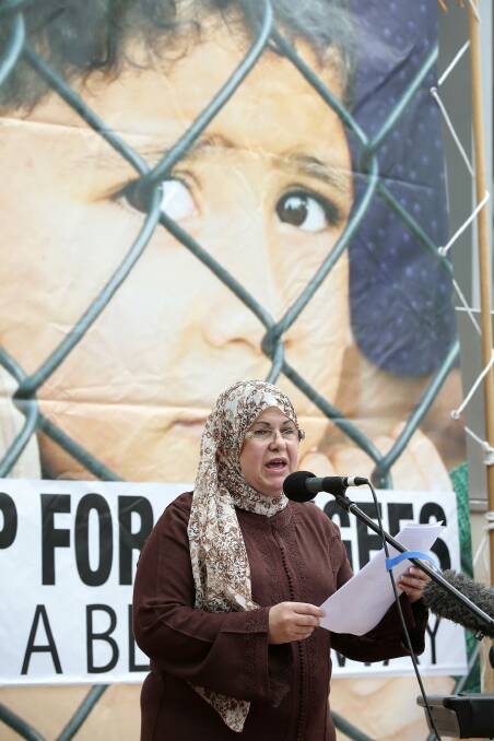 Diana Abdel-Rahman speaking at the Stand Up for Refugees rally at Garema Place in Civic.  Photo: Jeffrey Chan 