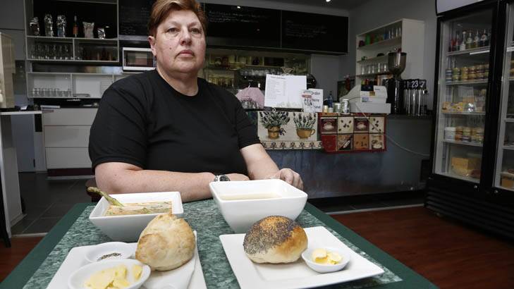 G's Market Cafe owner and executive cook Gina Casey with the two options from the menu. Photo: Jeffrey Chan