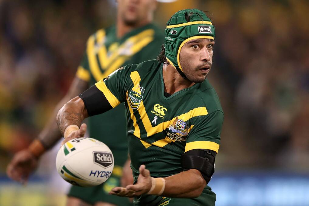 Johnathan Thurston of the Kangaroos passes during the Anzac Test match. Photo: Getty Images