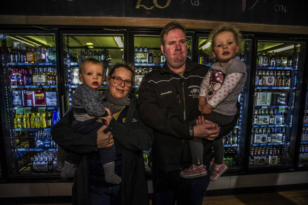 Paul Cain (pictured with wife Michelle, son Nicholas and daughter Sophie) fears for the future of his businesses should liquor licence fees be increased.  Photo: Karleen Minney