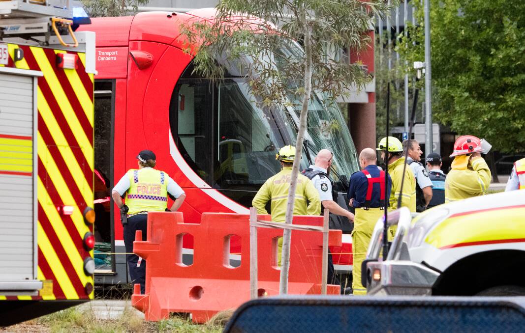 Emergency services at the scene of a collision involving a tram and a pedestrian at the intersection of Northbourne Avenue and Barry Drive on March 9. Photo: Elesa Kurtz