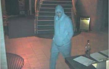 An image issued by police showing one the men who robbed the Italo-Australian club on June 28. Photo: Supplied
