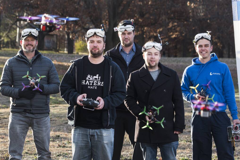 Canberra Multi-rotor Racing Club members Andy Soesman, Timothy Crofts, Joe Igoe-Taylor, Jacob Ryan and Dean Koeck will be taking part in the Canberra's drone racing championships on the weekend, which serves as a qualifying event for the national championships.  Photo: Elesa Kurtz