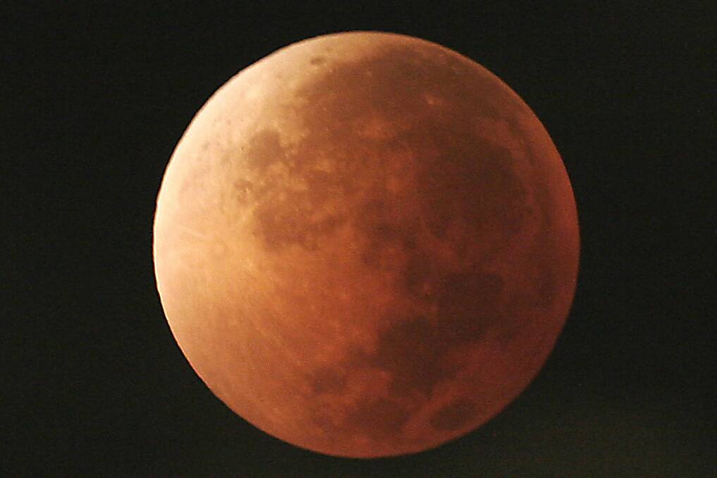 A  blood moon will be visible in Canberra on Saturday morning.  Photo: AP