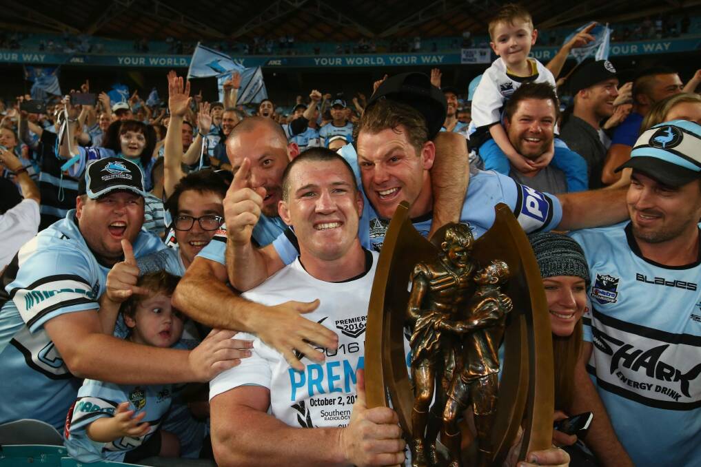 Sweet victory: Paul Gallen is mobbed by Sharks fans after the NRL grand final. Photo: Getty Images