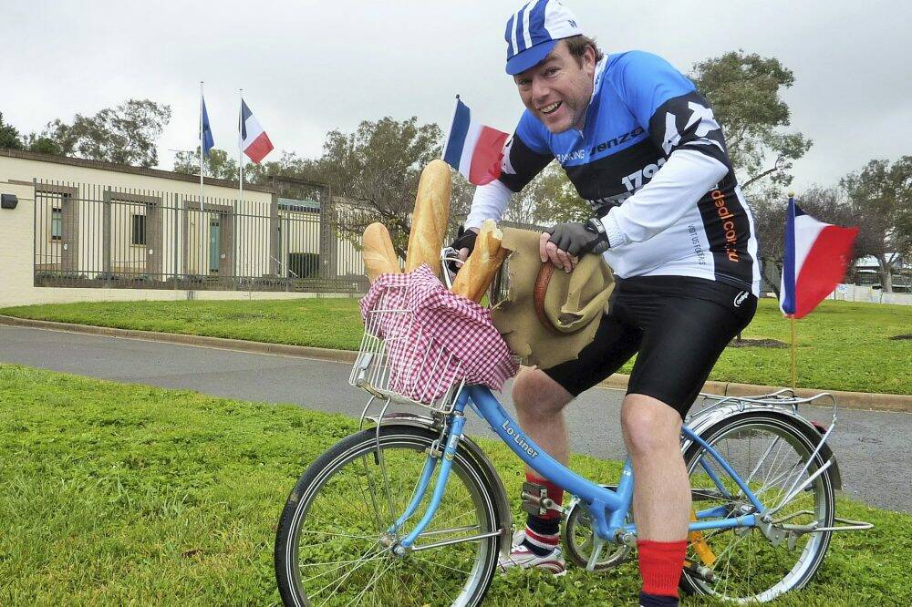 Tim takes a break outside the French Embassy in Yarralumla. Photo: Tristan Daly