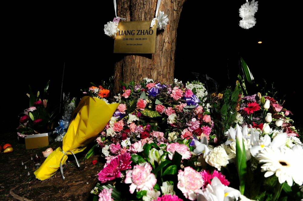 A memorial for murdered university graduate Liang Zhao by the side of Northbourne Avenue in Braddon in 2011. Photo: Stuart Walmsley