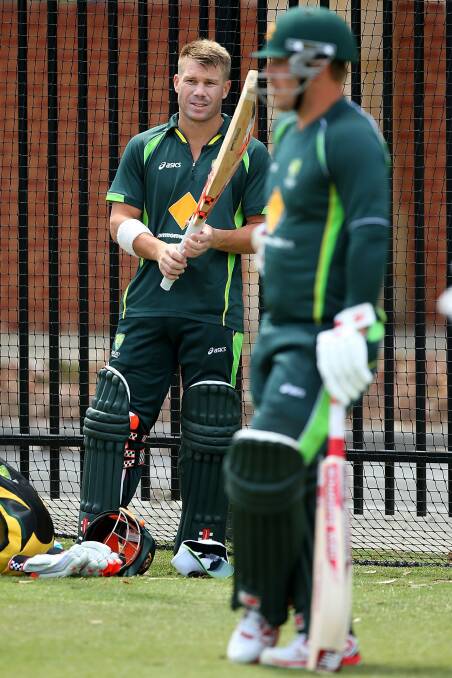 David Warner and Aaron Finch at a training session in Perth. Photo: Paul Kane