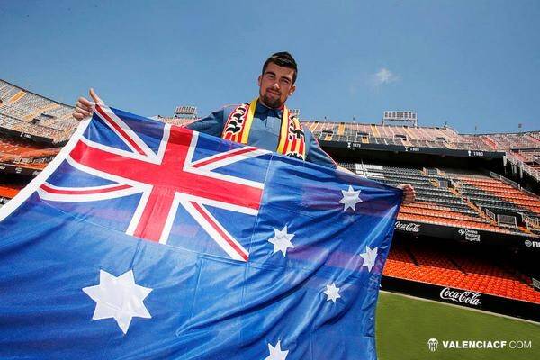 Mat Ryan brandishes the Australian flag at his new club Valencia. Photo: Twitter/Valencia