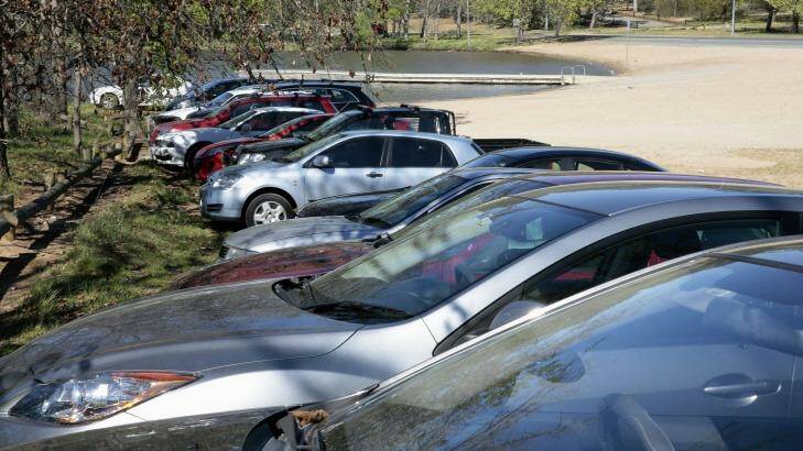 Cars parked near Lotus Bay in Yarralumla on the second day of pay parking in the Parliamentary triangle. Photo: Jeffrey Chan