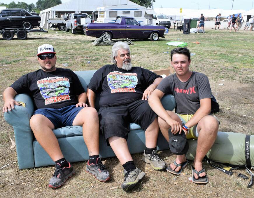 John Verwey, left, Andrew Verwey, centre, and Tyler Verwey, all from Tamworth, hope the ban on riding in the trays of utes at Summernats will not be permanent.  Photo: David Ellery