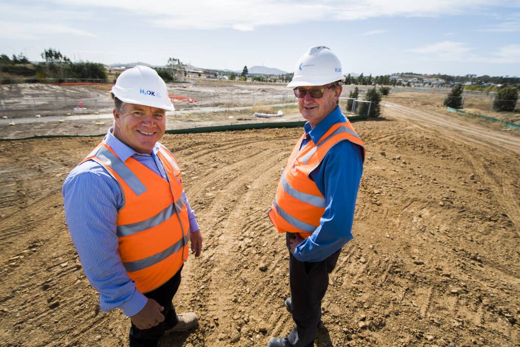 ACT Healthy Waterways project manager Justin Foley  and Martin Boyd from  lead contractors Construction Control on the site of the Holder wetlands. Photo: Elesa Kurtz
