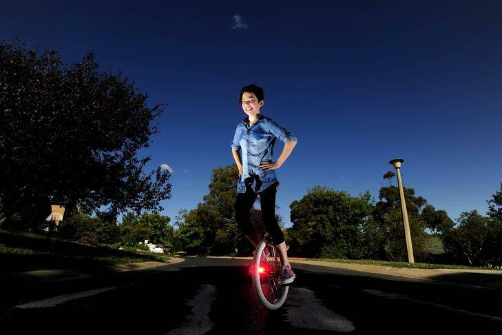 Lily McLaughlin, 13, of Weston is Australia's junior female unicycle point score champion after the recent Uninats event in Melbourne. Photo: STUART WALMSLEY