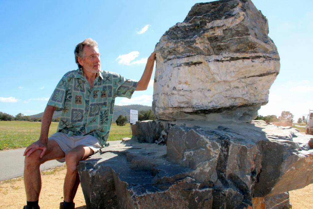 Hard to shift: Professor Brad Pillans admires the replacement boulder for the National Rock Garden. Photo: Mark Sawa