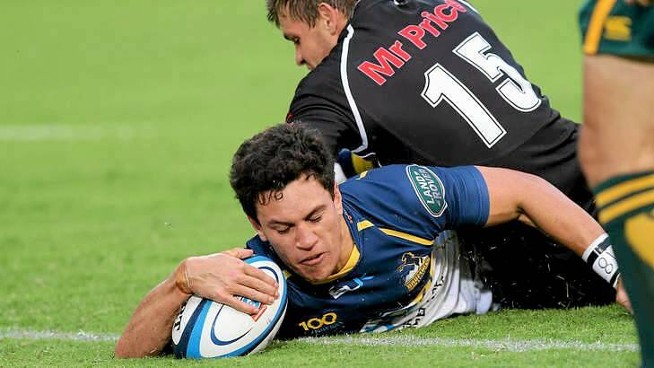 Matt Toomua crosses for one of four tries for the Brumbies in a lopsided first-half. Photo: AFP