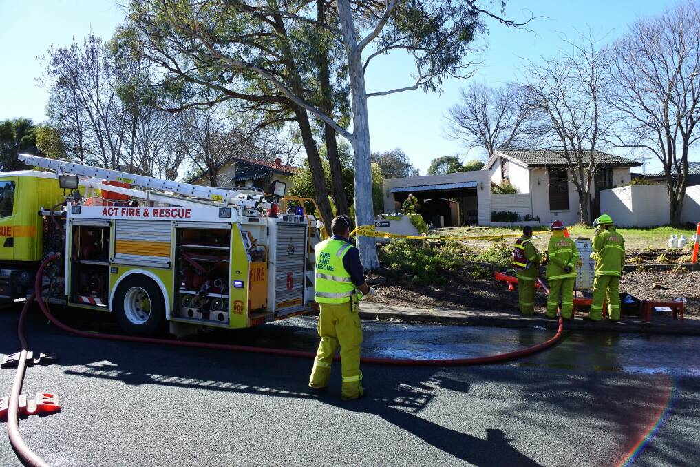 A house fire in Kambah racked up a damage bill of about $350,000, emergency services say. Photo: Clare Sibthorpe