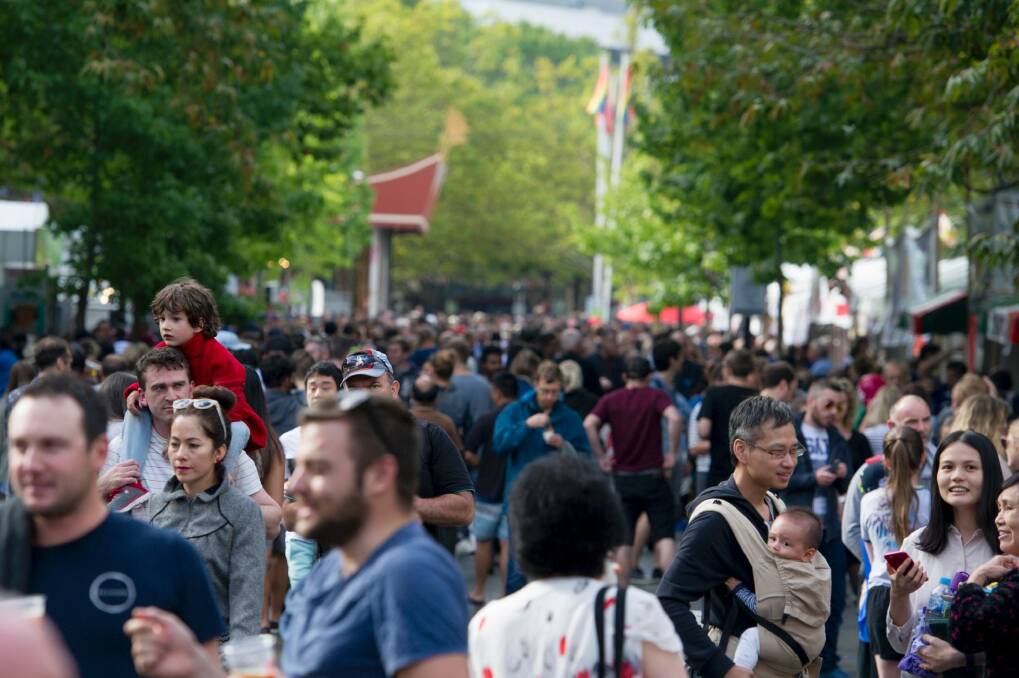 Crowds enjoy the 2017 Multicultural Festival in Canberra. United Voice secretary Lyndal Ryan said a security guard at this event told her some of his fellow guards were subcontracted by head contractor SNP Security. Photo: Jay Cronan