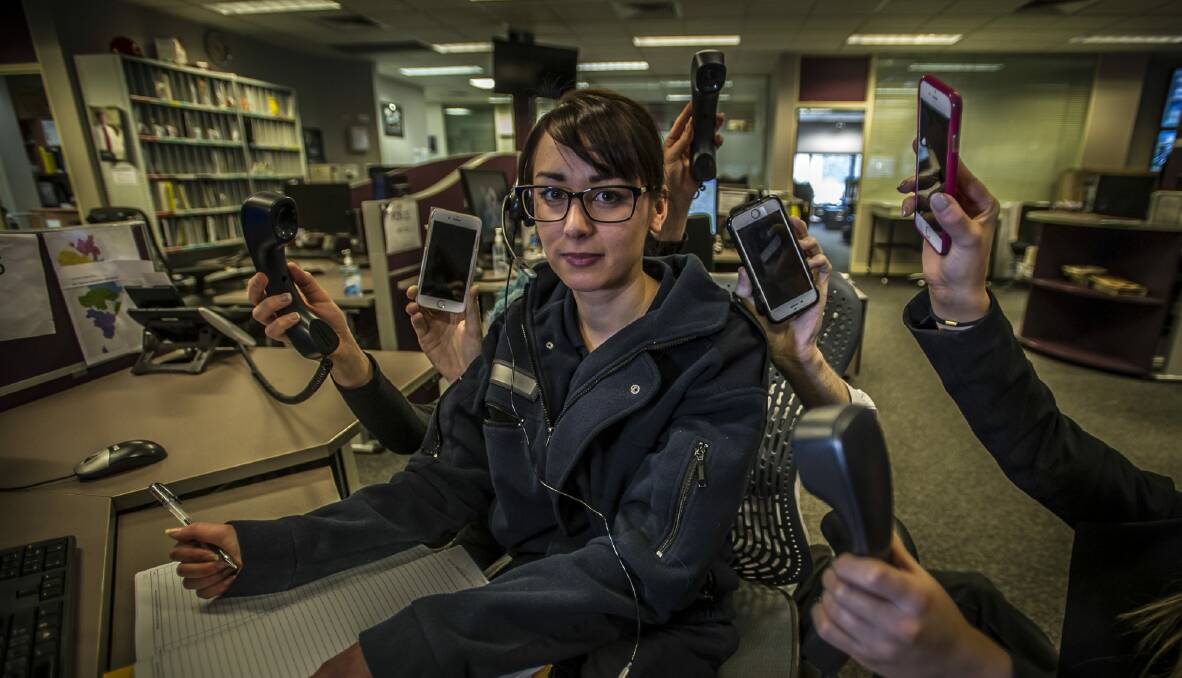 Sworn and unsworn officers such as ACT Operations team member Ali Chan have to juggle many emergency and non-emergency calls at once.  Photo: Karleen Minney