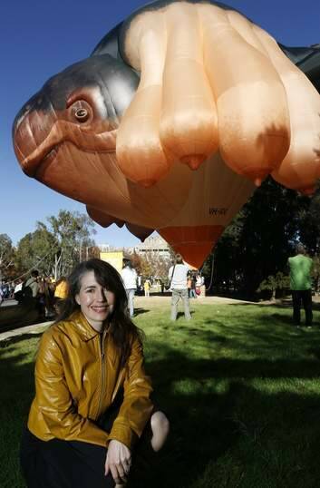 Artist Patricia Piccinini with her work Skywhale at the National Gallery on Saturday. Photo: Jeffrey Chan