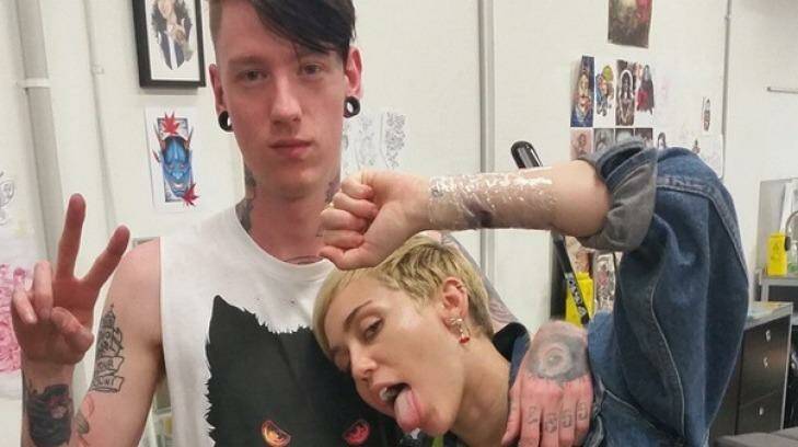 Myles Paten from Collingwood's Eureka  Rebellion Trading and "homie" Miley Cyrus on Thursday night. Photo: Instagram
