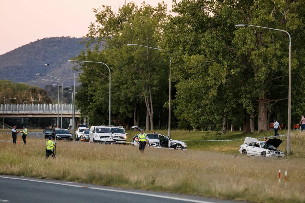 Police attend the scene of an accident on Yarra Glen in Hughes on Tuesday evening.  Photo: Sitthixay Ditthavong