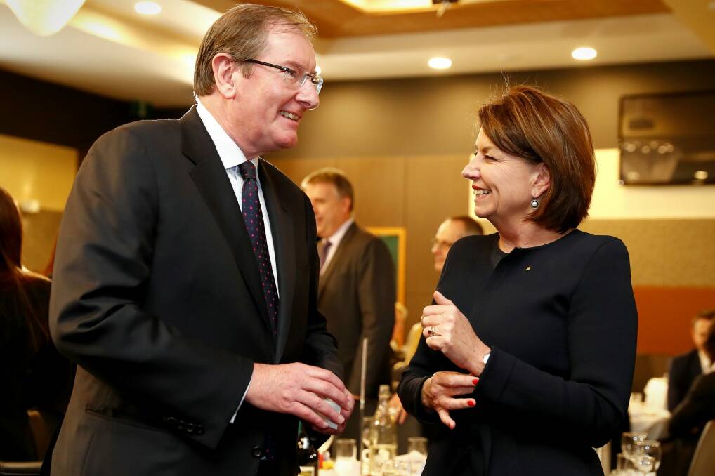 Brian Loughnane, former federal director of the Liberal Party, speaks with Anna Bligh, after her address to the National Press Club. Photo: Alex Ellinghausen