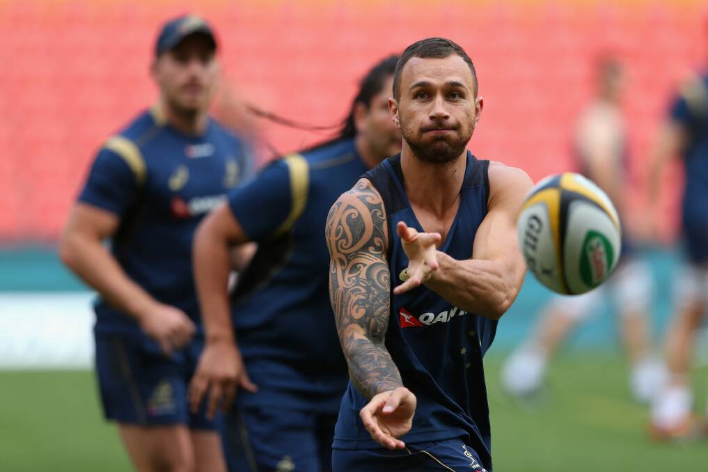 Halves duo embrace their new roles: Quade Cooper (pictured) will form a bench combination with Will Genia.  Photo: Getty Images