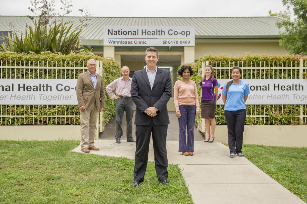 The people behind the new Wanniassa Medical Centre: (l-r) Service One Alliance Bank chief executive officer Peter Carlin, GP Dr Sandor Ertz, National Health Co-op managing director Adrian Watts, GP Dr Anu Sumathipata, receptionist Emily Coveny and nurse
Cheryl Castaneda.
 Photo: Jay Cronan