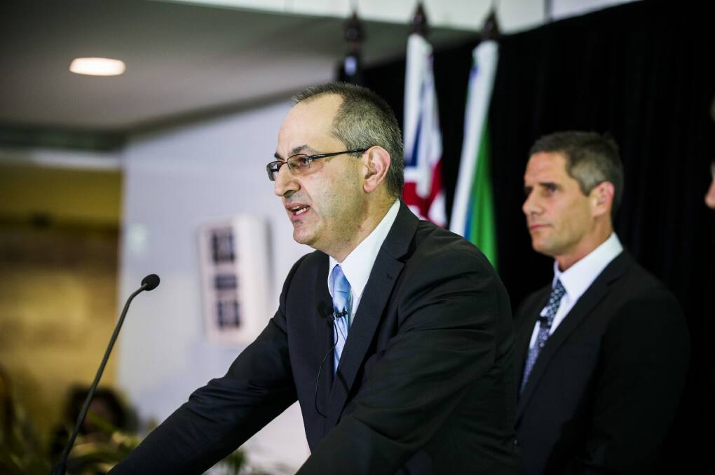 Double act: Immigration Department secretary Michael Pezzullo and Customs chief Roman Quaedvlieg outline plans to integrate their workforces. Photo: Rohan Thomson