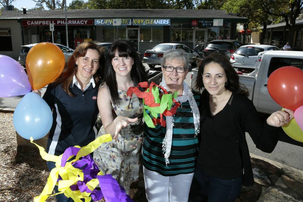 Ready for the party at the Campbell shops, from left, Rani Kalimeris from IGA Campbell, Parties at the Shops producer Amy Moon, local organiser Ingrid Ross and Toni Pelle from IGA Campbell. Photo: Jeffrey Chan