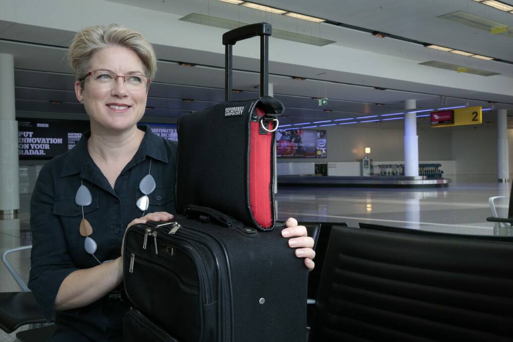 Trish Smith with the Airpocket carry-on bag that she will launch on Kickstarter on March 3.   Photo: Jeffrey Chan