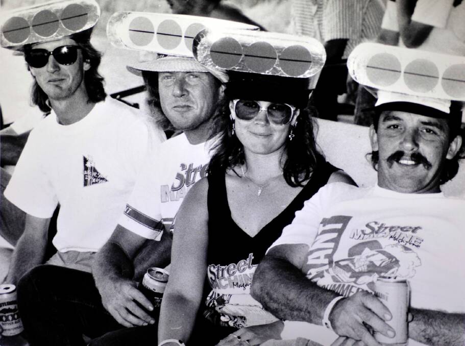 John Hoger, Gary Stewart, Emma Wilsonm and Brad Stewart wear matching hats in December 1988. Photo: Canberra Times