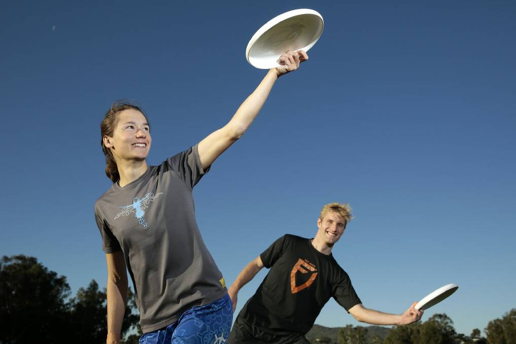 ACT women's team co-captain Adelaide Dennis with Phil Swan from men's team Fyshwick United ready for the Brisbane-Canberra invitational ultimate frisbee tournament being held in Canberra this weekend.    Photo: Jeffrey Chan