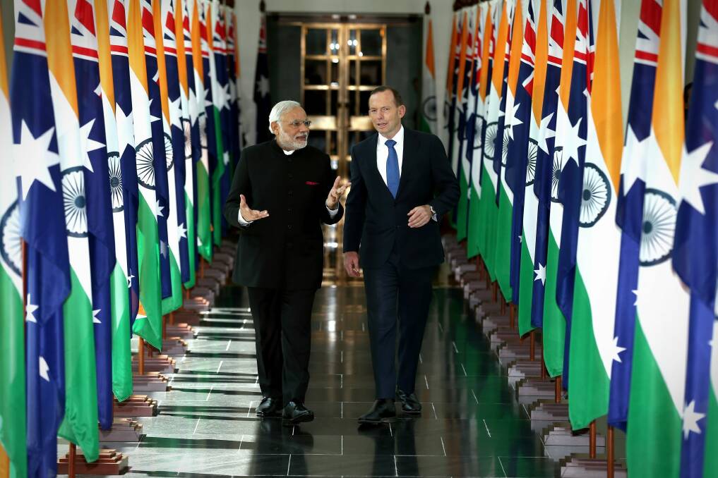 Mr Modi and Mr Abbott during the Indian Prime Minister's 2014 visit. Photo: Alex Ellinghausen