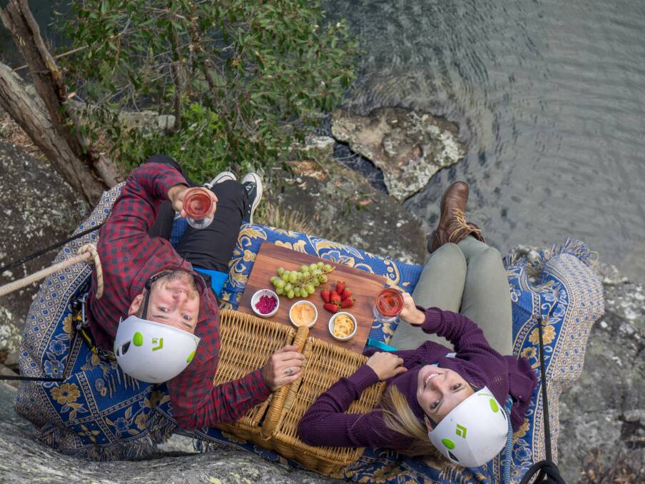Fancy a romantic picnic while dangling over a cliff-top? Photo: Supplied