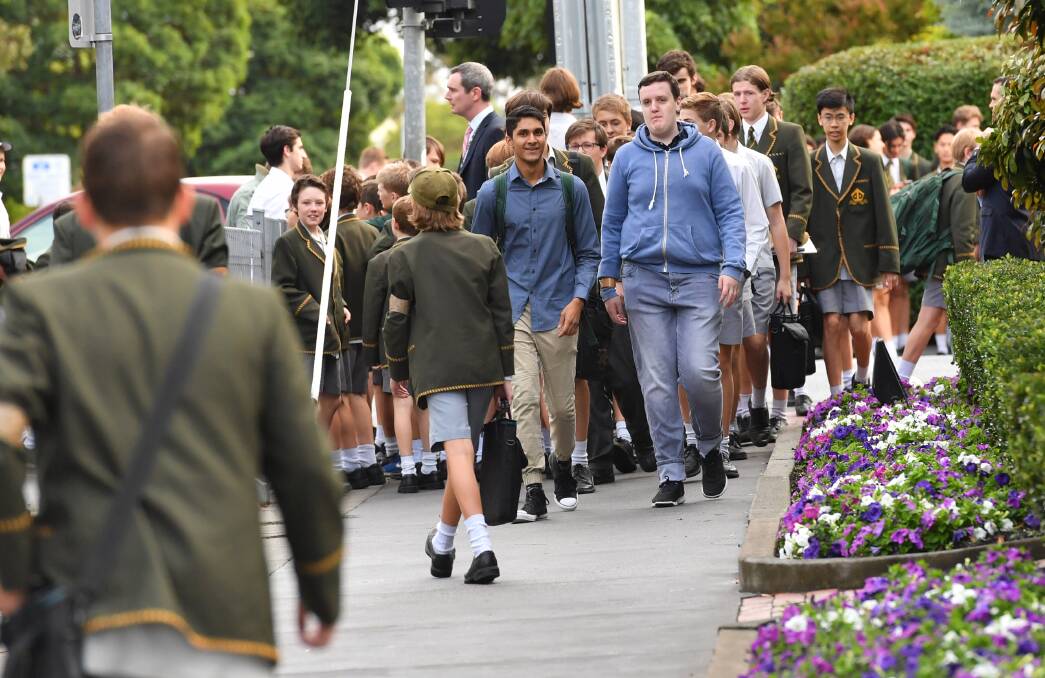 Some Trinity students have been wearing smart casual clothes to school in protest at Rohan Brown's sacking. Photo: Joe Armao