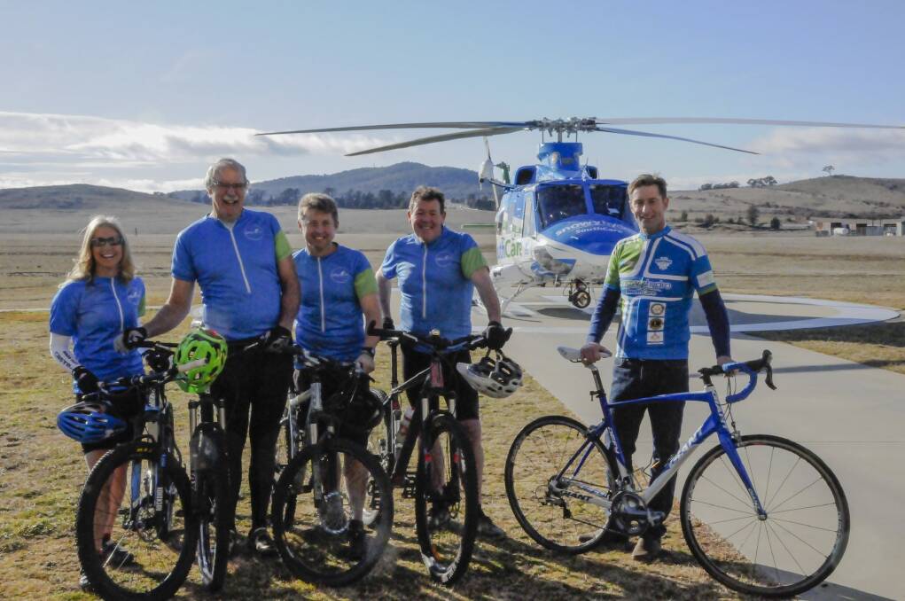 Lifecycle rider Krissi Brewster, regional ride co-organiser Tony Cory, coordinator Mark Blake, rider Kevin Herring and Snowy Hydro SouthCare helicopter CEO and Lifecycle ambassador Chris Kimball. Photo: Kimberley Le Lievre