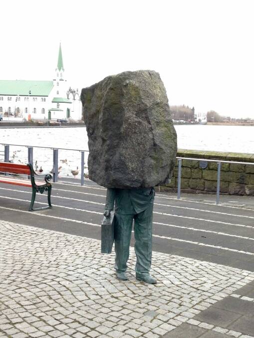 Reykjavik's 'Unknown Public Servant' sculpture, weighed down by the 'rock' of great responsibility. Photo: Peter Sesterka