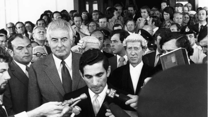 Gough Whitlam listens to David Smith read the proclamation dissolving Parliament in 1975.