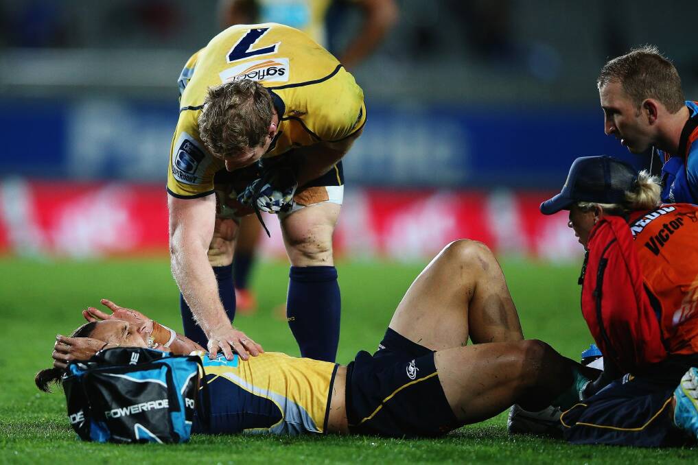 David Pocock of the Brumbies checks on Matt Toomua during the team's last trip to Eden Park. Photo: Getty Images