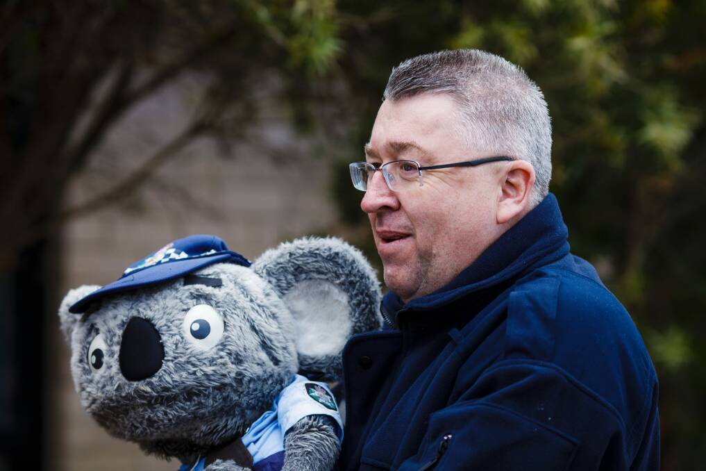 David Packwood with his new best mate, Constable Kenny Koala. Photo: Sitthixay Ditthavong