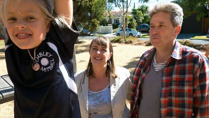 Former federal minister Nicola Roxon, centre, with husband Michael and daughter Rebecca, 7.