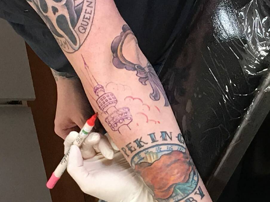 Grant Heino's Telstra Tower tattoo took 90 minutes in the chair. Photo: Supplied