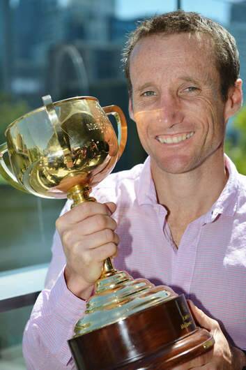 On board ... Melbourne Cup winner Damien Oliver. Photo: Getty Images