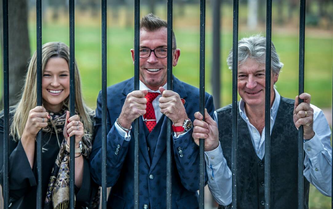 Millie Whittaker, of WOTSO Workspace, Richard Luton, of Luton Properties, and Jed Johnson, of Random Computing, all served jail time to raise money for suicide prevention. Photo: Karleen Minney
