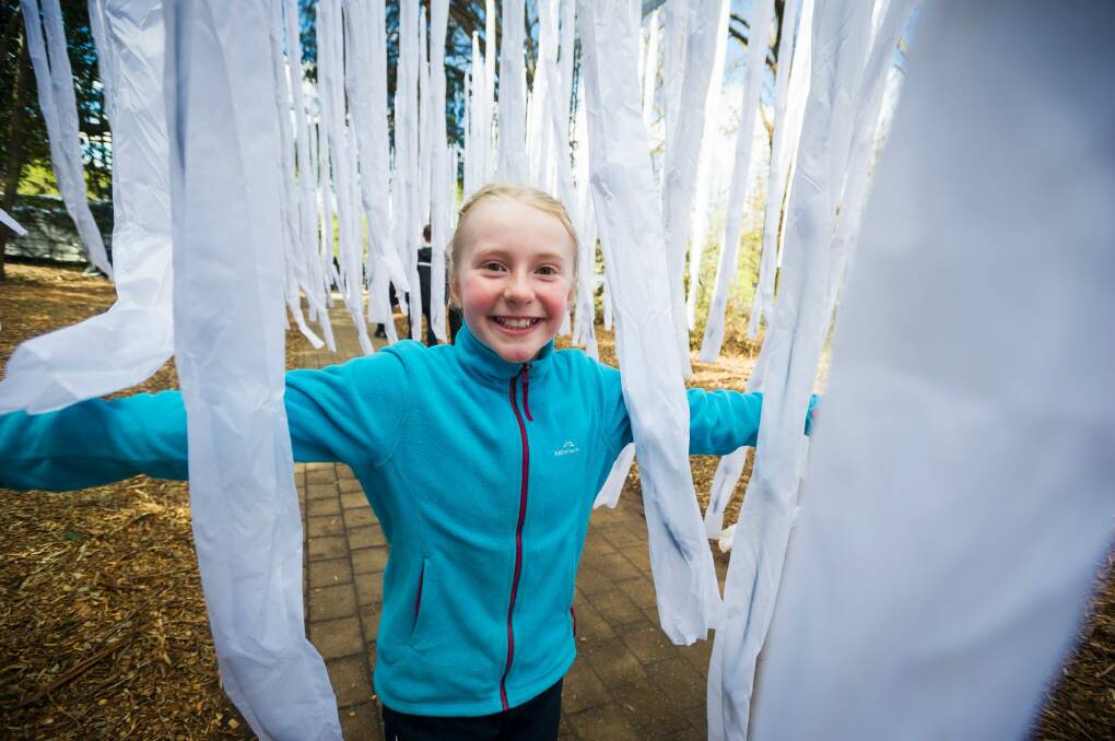 Katherine Stewardson, 11, enjoying the opening day of Floriade. Photo: Dion Georgopoulos